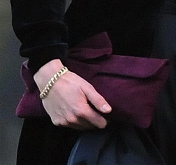Kate-Aubrey-Fletcher-Wedding-January-2011-Black-Libelula-Dulwich-Purple-Bag-Closeup-Splash-.jpg