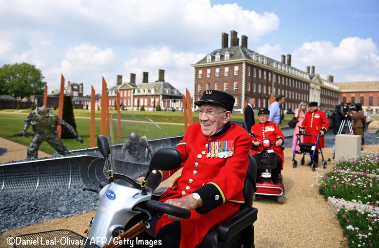 Chelsea-Flower-Pensioners-Riding-Scooters-D-Day-75-Garden-May-20-2019-Daniel-Leal-Olivas-AFP-Getty-777-x-500.jpg