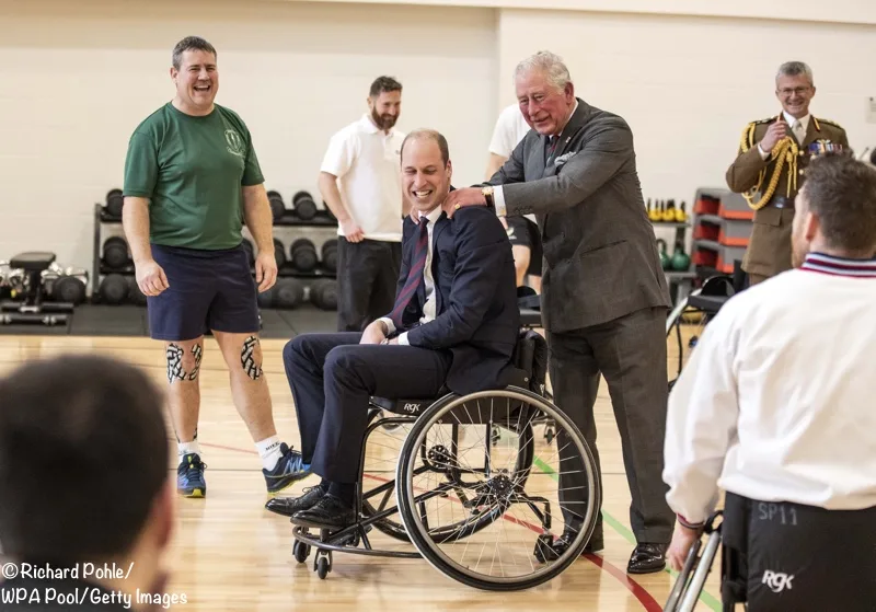 Prince Charles rubbing Prince William's Shoulders Basketball Defence Rehab 